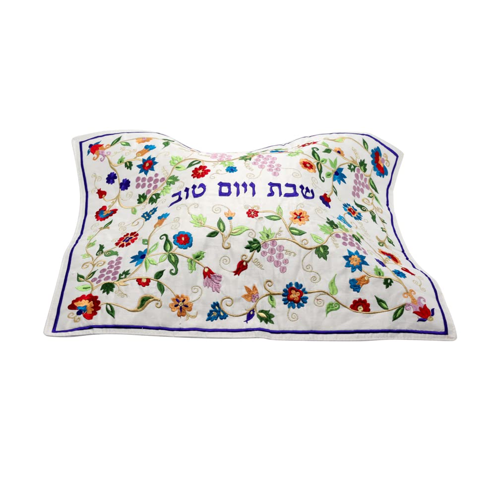 EMANUEL Yair detalle bordado seda, colores vibrantes para realzar la mesa de Shabbat.