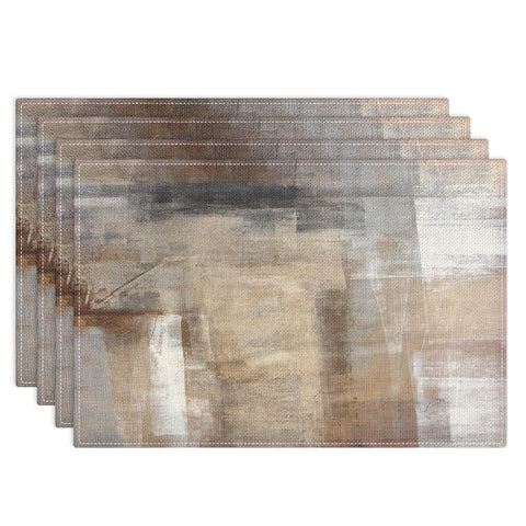 Emvency individuales con diseño abstracto blanco y marrón, protegen la mesa durante comidas.