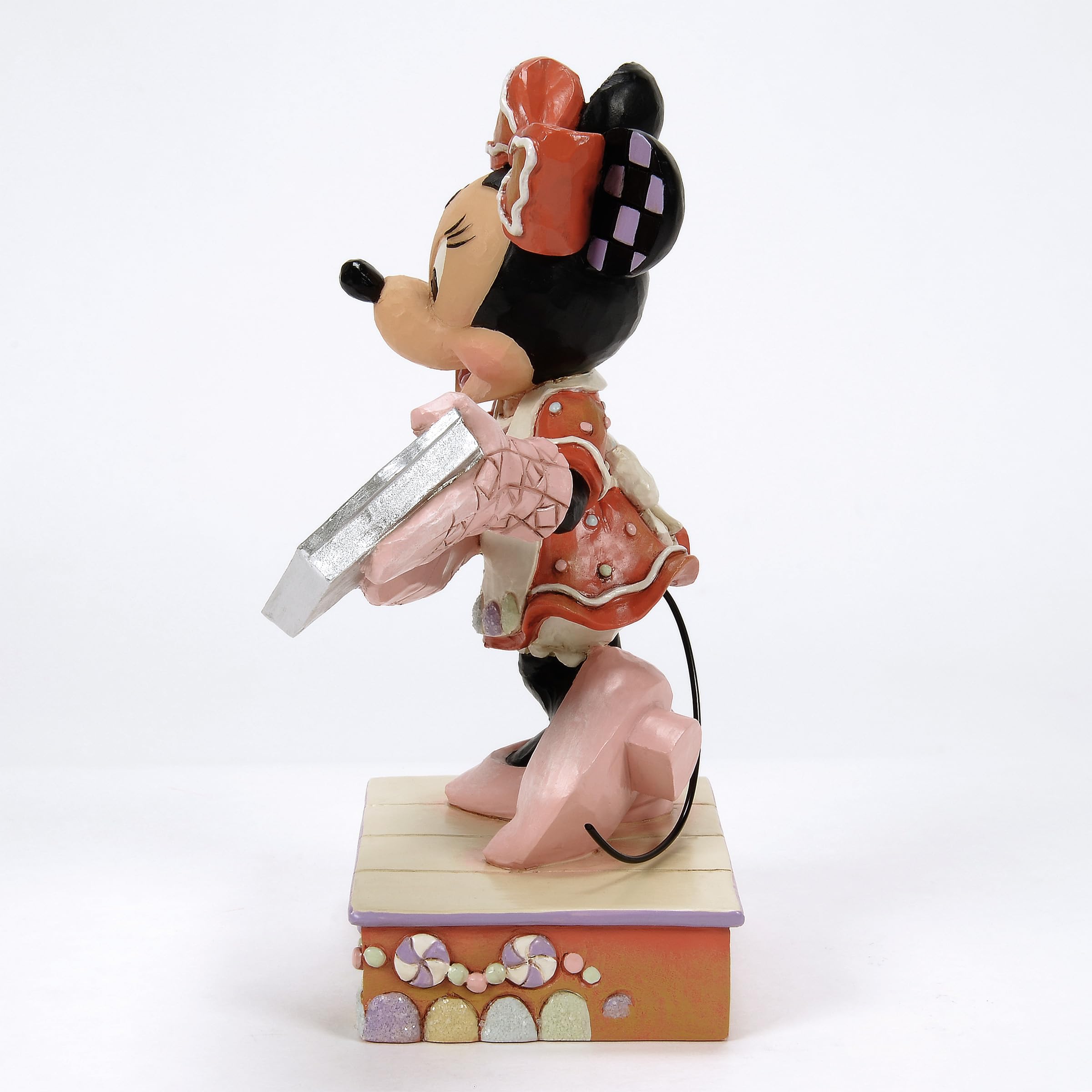 Detalles de Disney Traditions por Jim Shore en figura de colección de alta calidad.