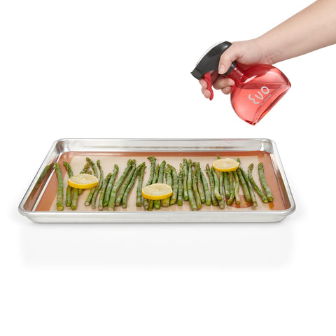 Uso versátil Evo en cocina, perfecta para aceites y vinagres.