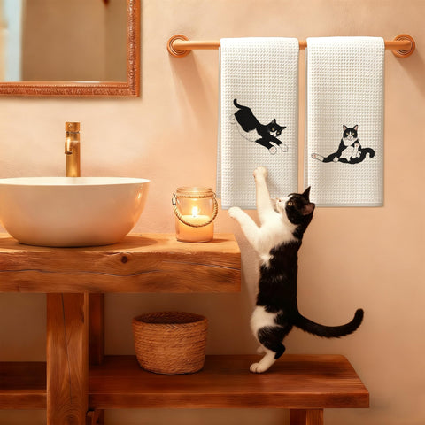 Exqcom toallas gato tuxedo, ideal para secar superficies tras comer.