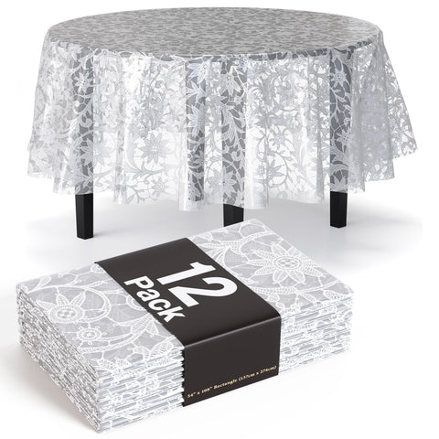 Mantel redondo Exquisite de encaje blanco protege la mesa con estilo.