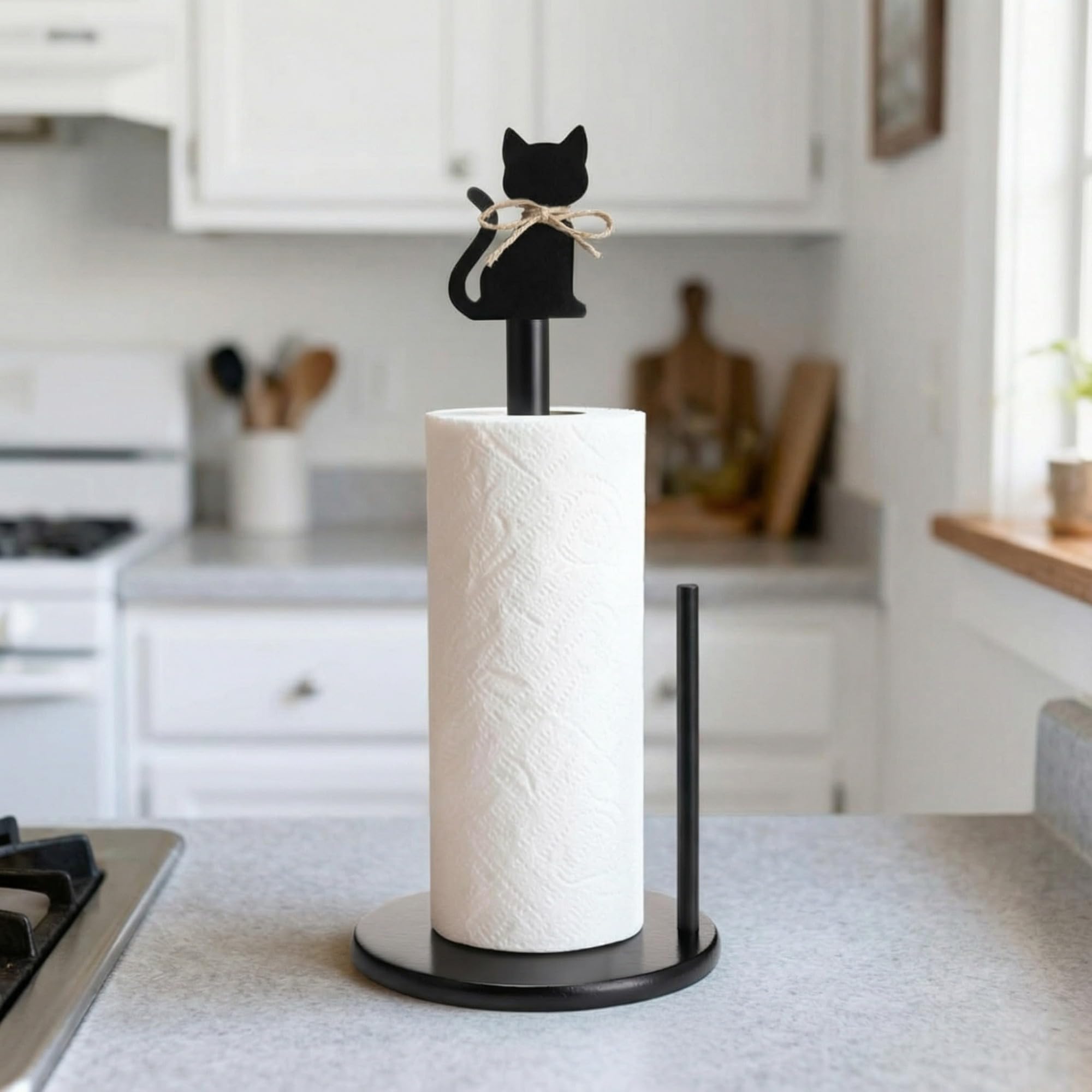 Ferrochef sostén de papel con gato negro giratorio sobre base estable.