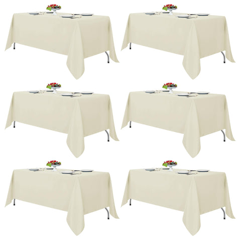 Mantel marfil Fitable para mesa rectangular de 70x120 pulgadas, ideal para banquetes.