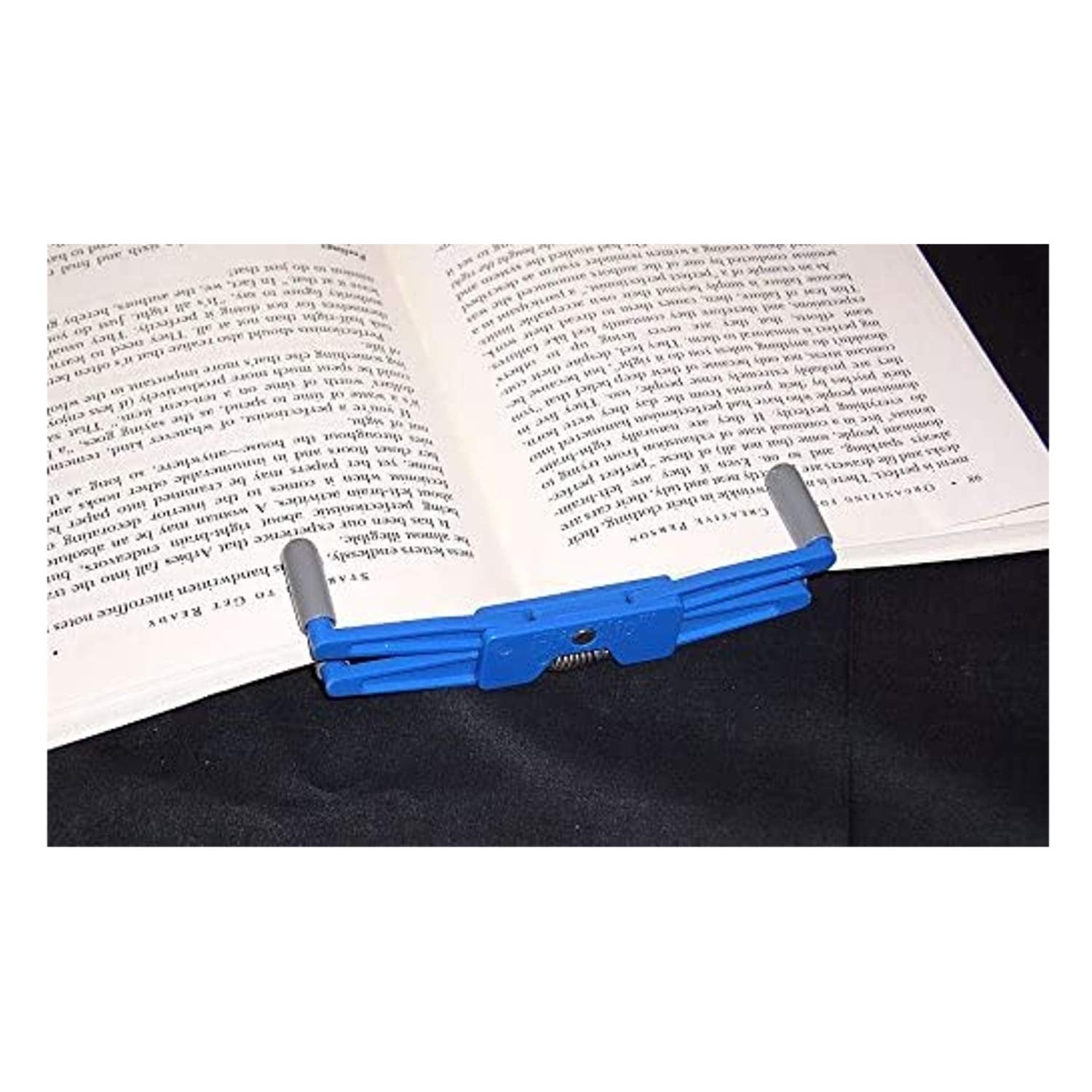 FlipKlip permite lectura manos libres durante ejercicio, manteniendo las páginas seguras.