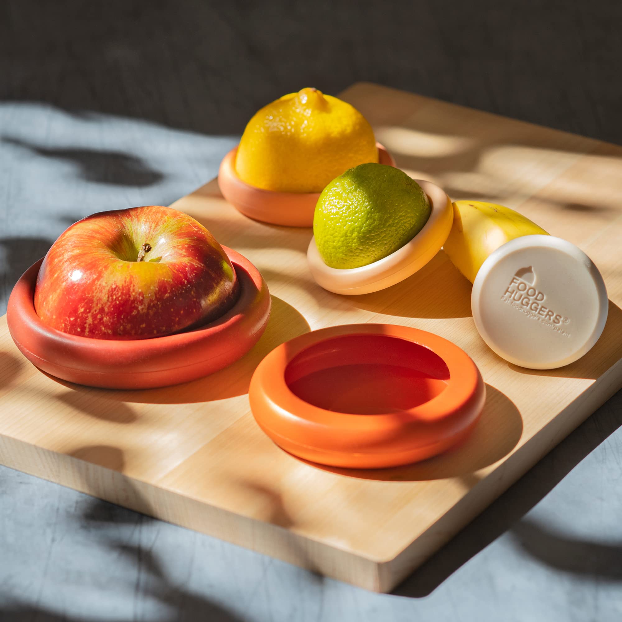 Food Huggers diseño duradero de silicona mantiene alimentos frescos por más tiempo.