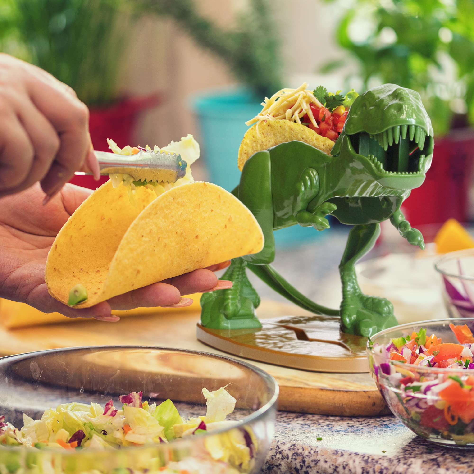 Funwares Tacosaurus, diseño divertido para animar comidas familiares sin complicaciones.