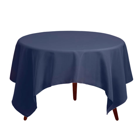 Detalle de bordes en mantel Gee Di Moda azul marino para un acabado pulcro.