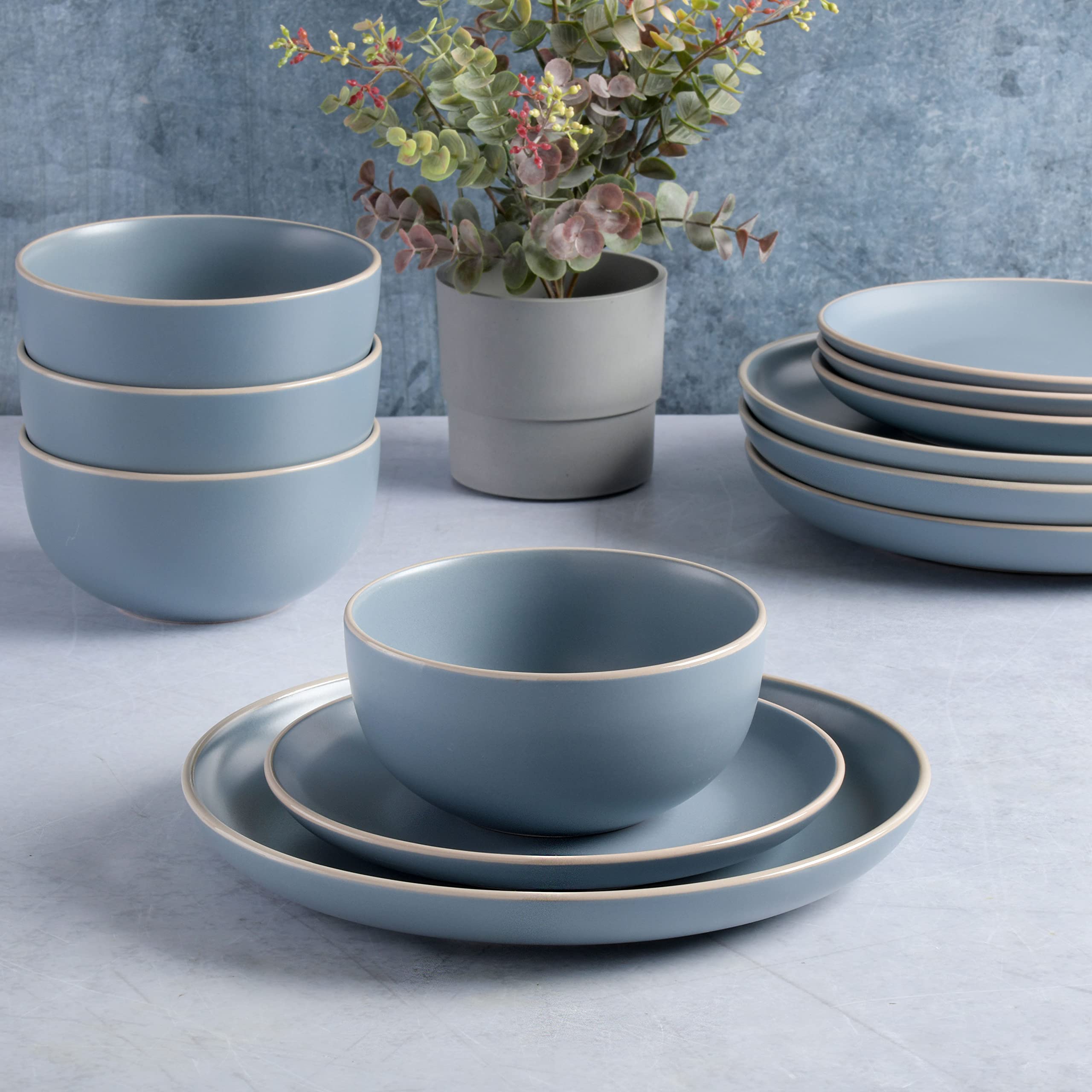Gibson Home Rockaway, borde cremoso azul y acabado mate para estilo elegante.