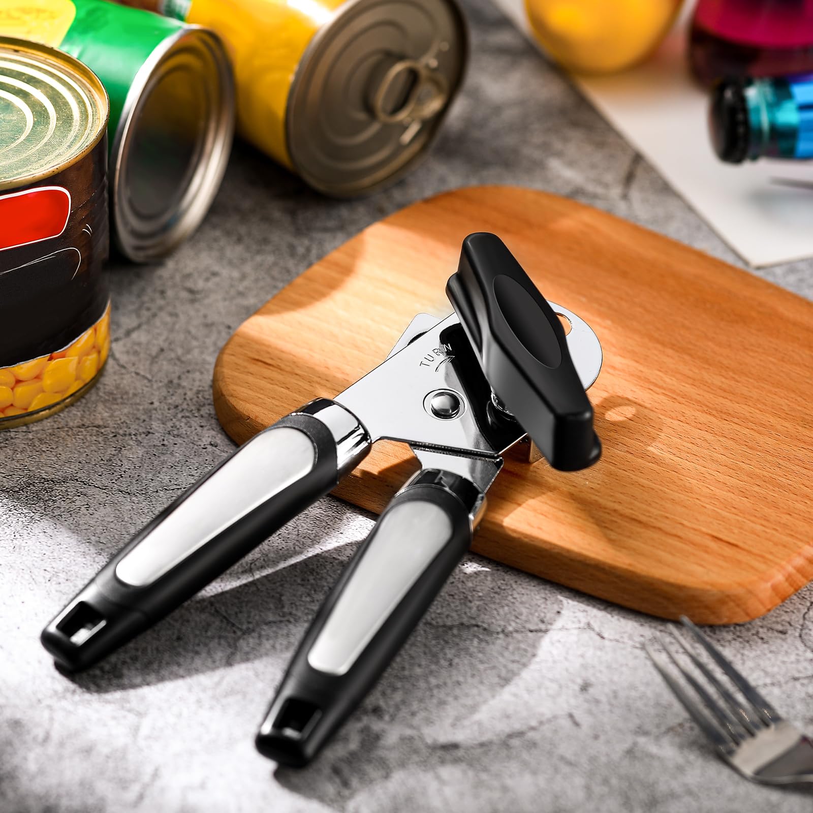 Gisafai abrelatas manual con perilla grande para abrir latas con comodidad.