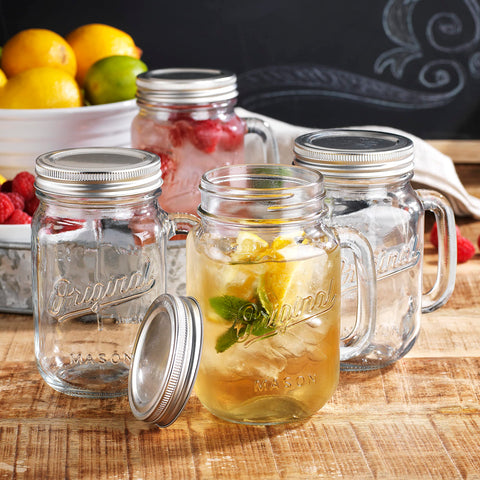 Conjunto de 4 jars Mason 16oz con asa y tapa, ideal para reuniones.