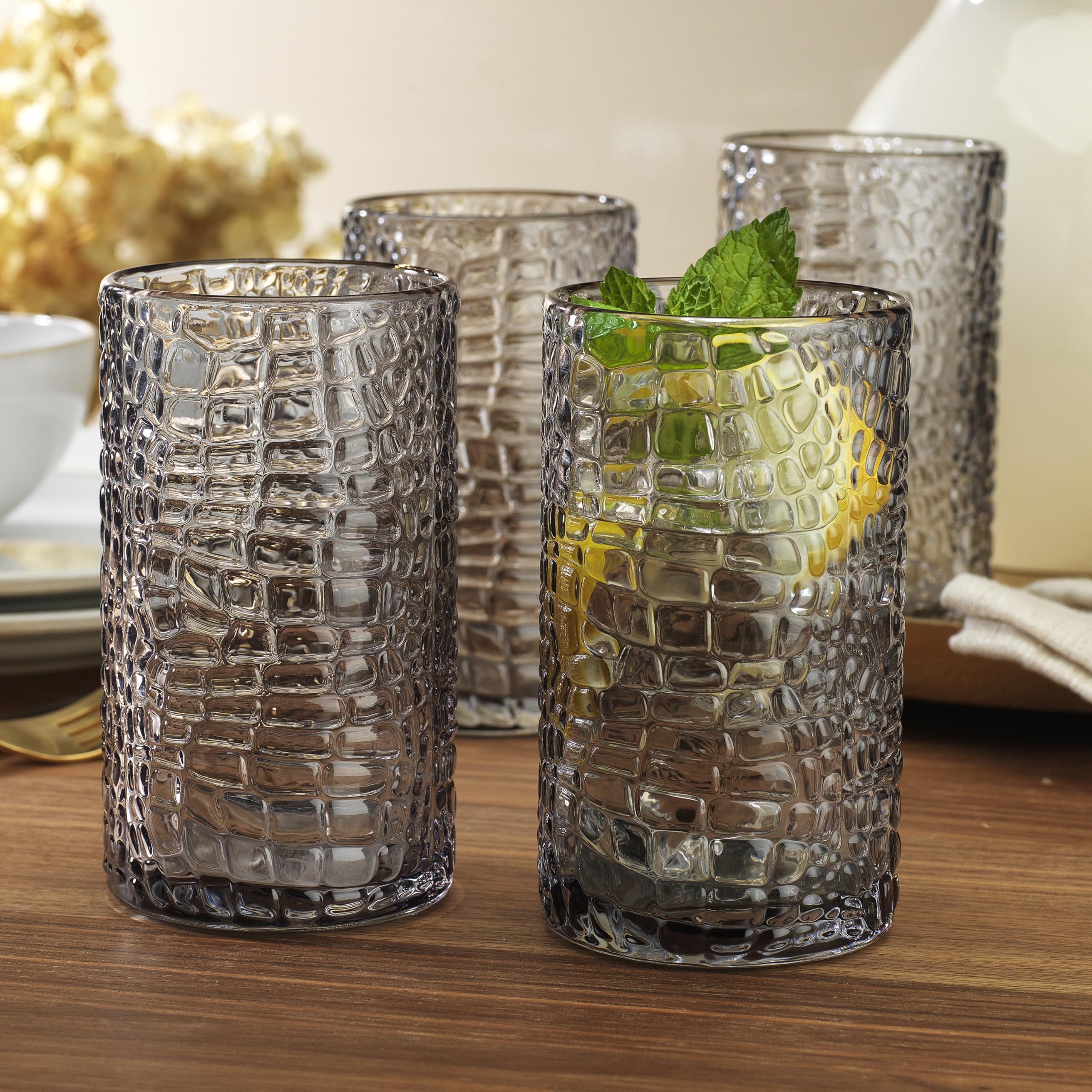 Glaver's vaso de cristal claro con tinte rosado, aspecto moderno en mesa.