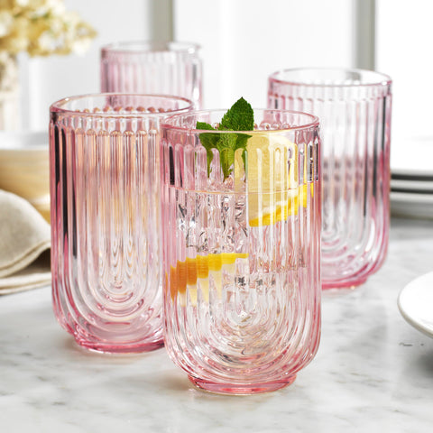 Vaso Glaver's rosa Art Deco con detalle de arco para presentaciones elegantes.
