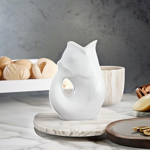 Gurgle Pot, vertido con sonido gorgoteo, ideal para sorprender en reuniones.