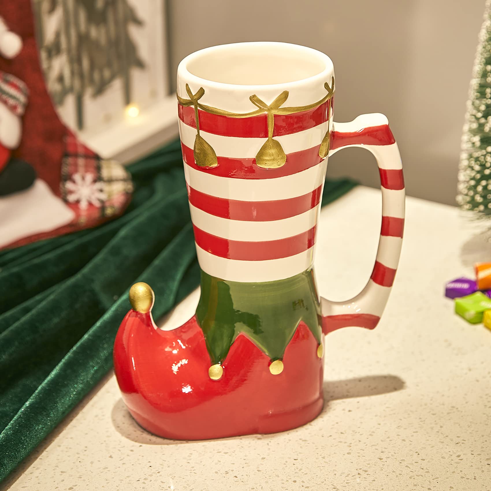 Taza Gute elfo-calcetín-caramelo: ideal para cacao cremoso y momentos festivos.