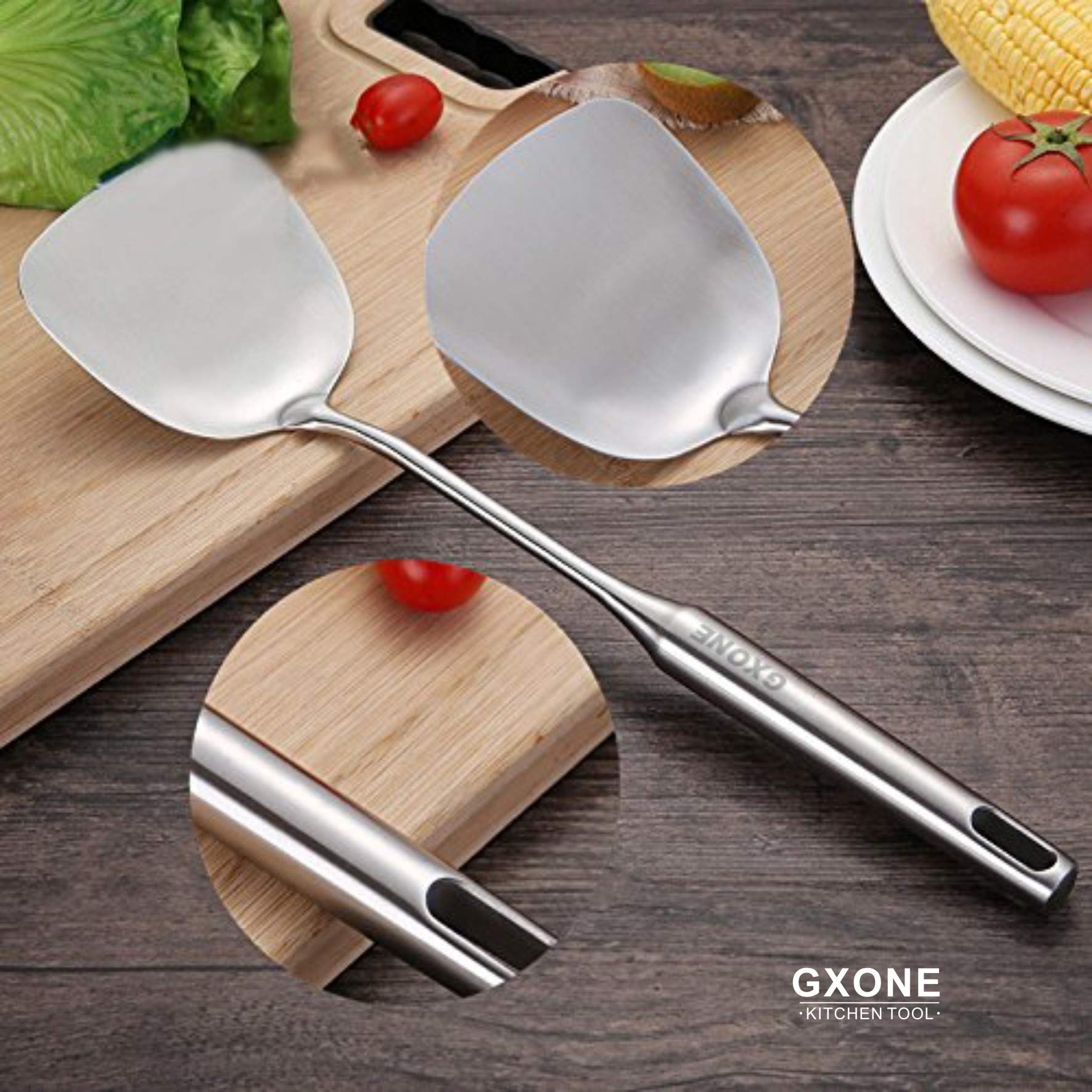 Espátula GXONE detalle mango hueco ergonómico, cómodo de agarrar durante la preparación.