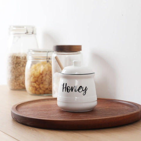 HAOTOP tarro miel decorativo en despensa blanca, aporta estilo y orden.