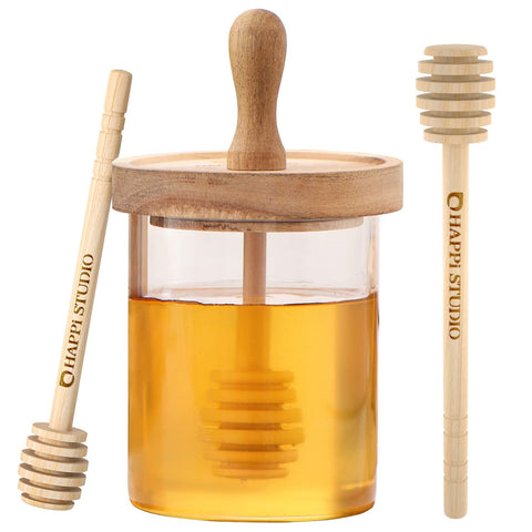 Frasco de miel HAPPI STUDIO de vidrio con palito de miel y tapa de madera.