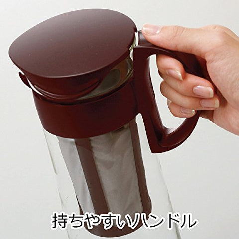 Vertedor delgado para verter café frío con control.