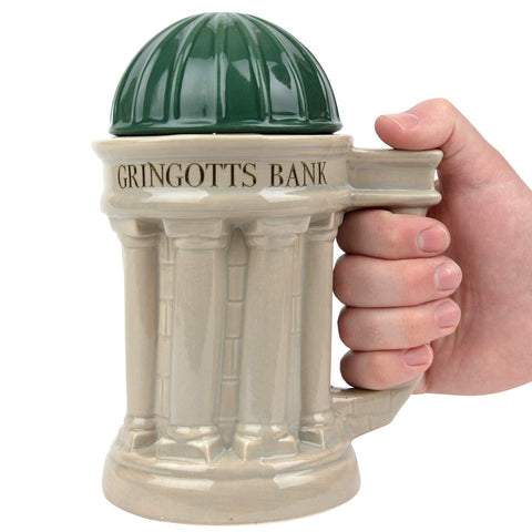 Taza Gringotts de Harry Potter 30 oz, tapa cerrada, mantiene caliente y evita derrames.