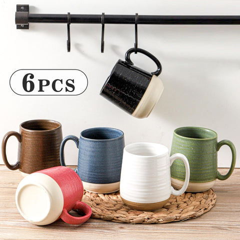 Hasense taza ergonomica con manija ancha para un agarre comodo.