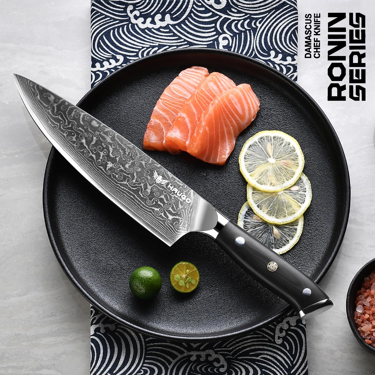 Haugo cuchillo damasco con núcleo VG10 japonés para durabilidad y resistencia a la corrosión.