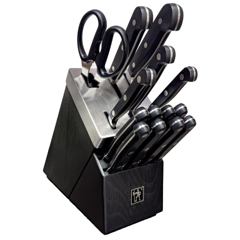 Cuchillos Henckels Classic en bloque autoafilante para cortes precisos y consistentes.