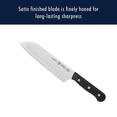 Santoku 7 pulgadas con borde hueco Henckels Solution, control cómodo y cortes limpios.