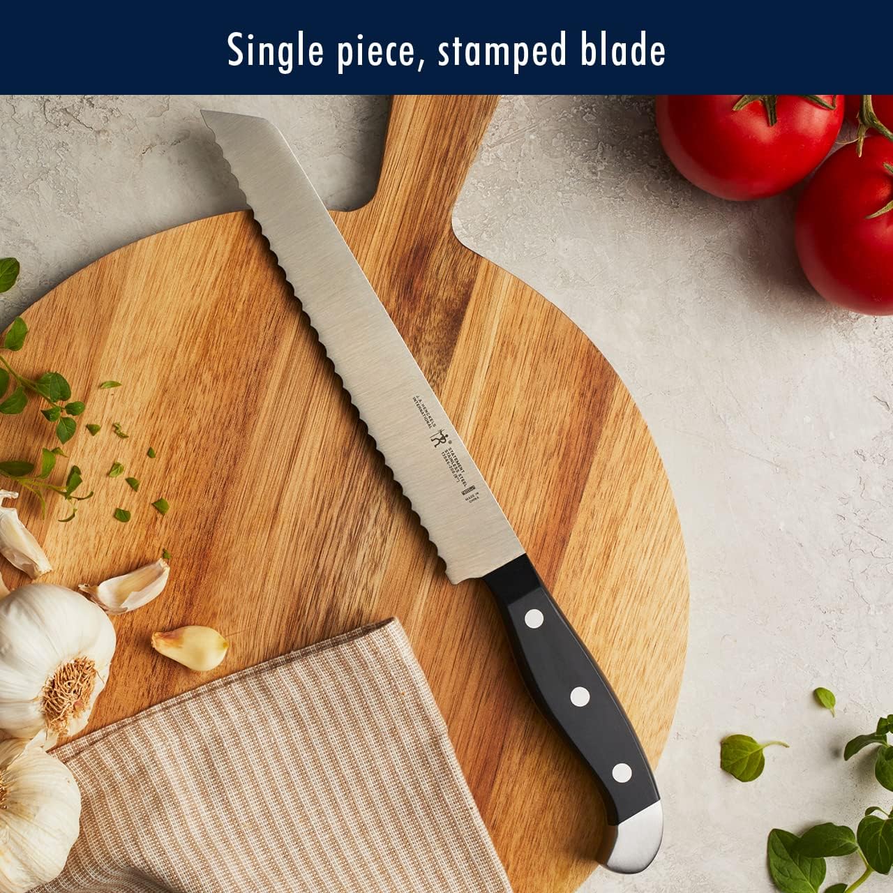 Cuchillo utilitario serrado Henckels Statement 5 pulgadas para alimentos con corte suave