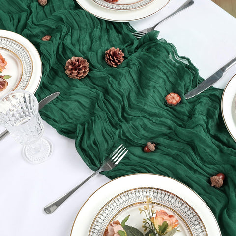 Heneger drapeado para ambiente de mesa con gasa verde esmeralda.