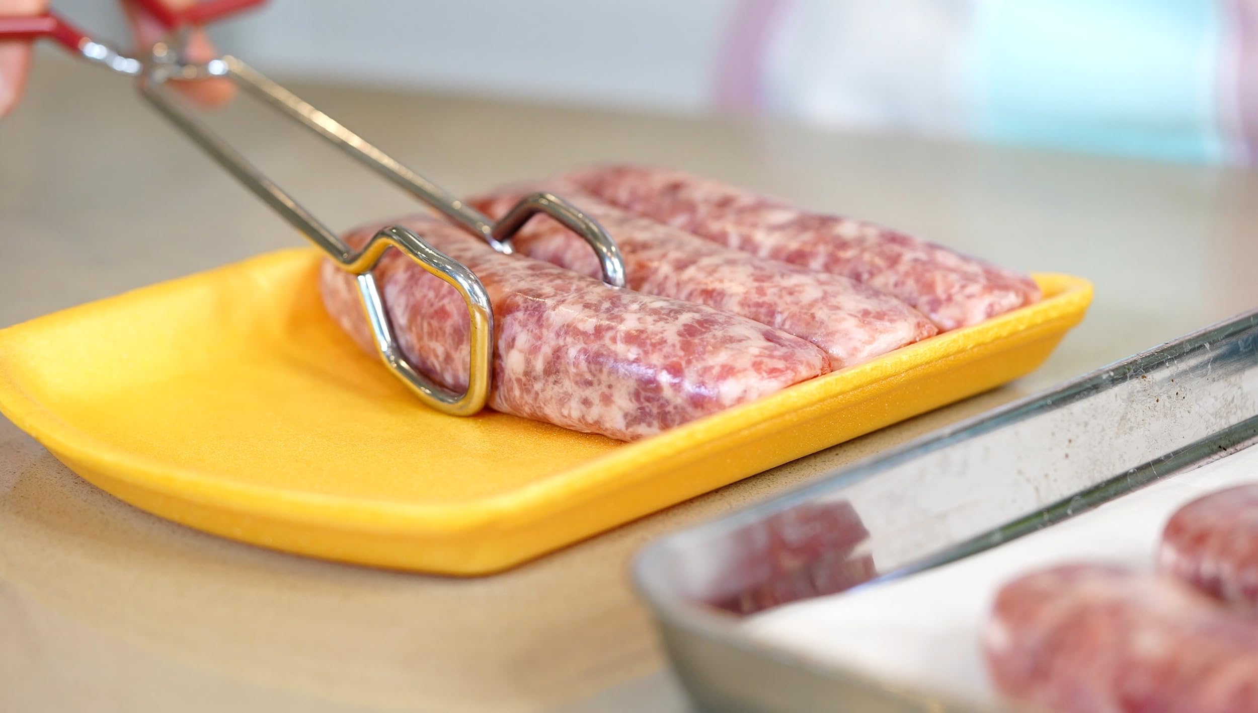 Hiash pinzas para barbacoa, manejo seguro de alimentos calientes.