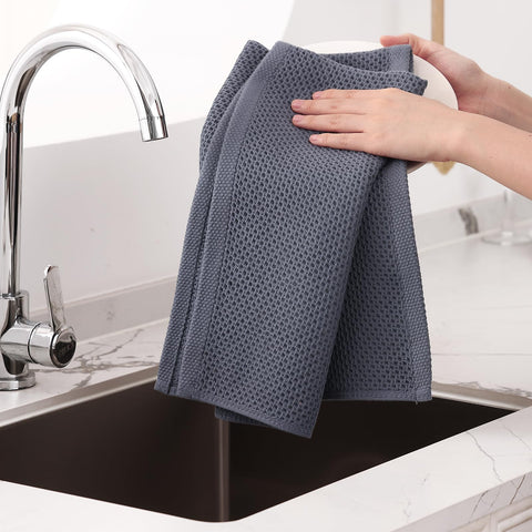 Toallas de cocina absorbentes para secar utensilios rápidamente.