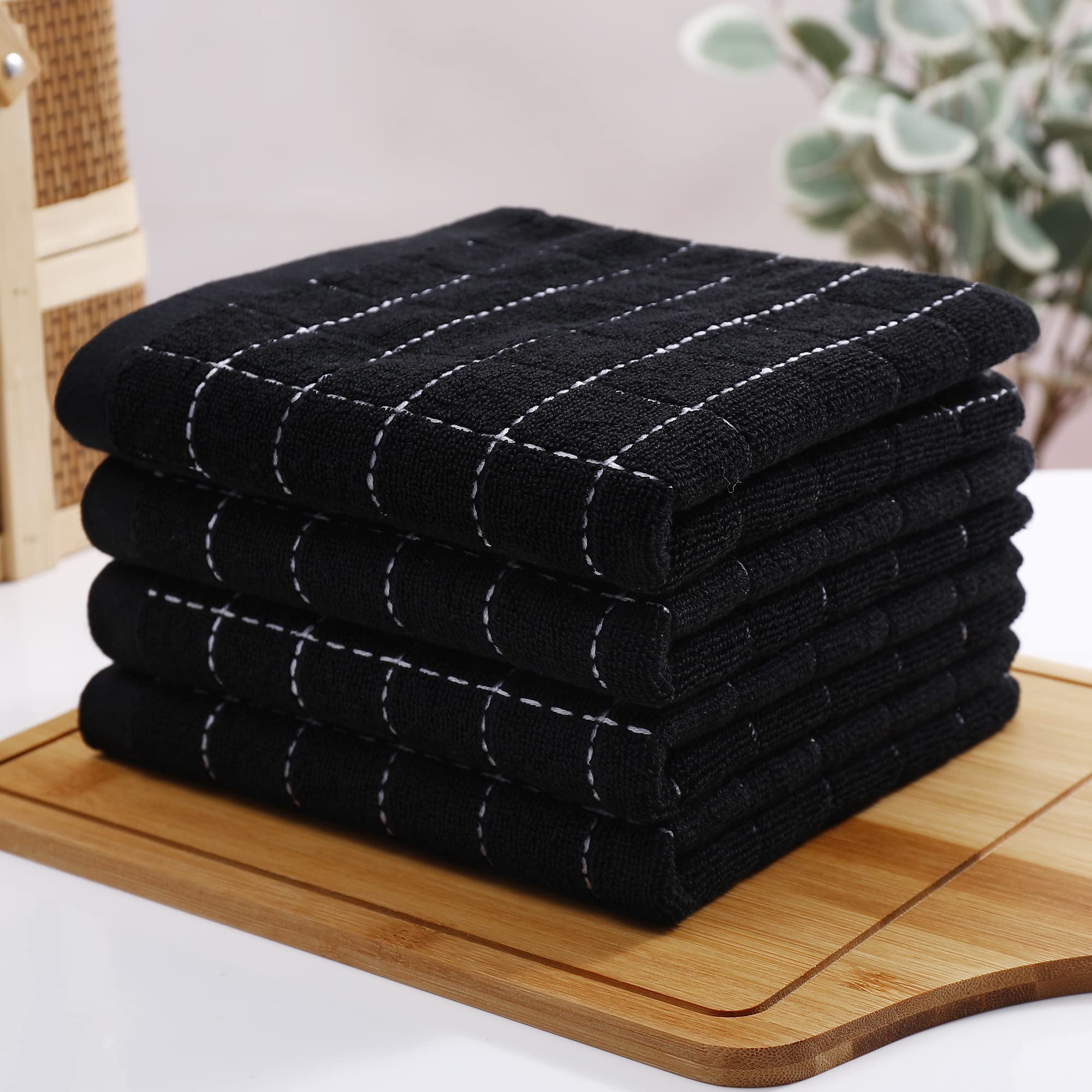 Homaxy diseño negro con cuadros, elegante y funcional para cocinar.