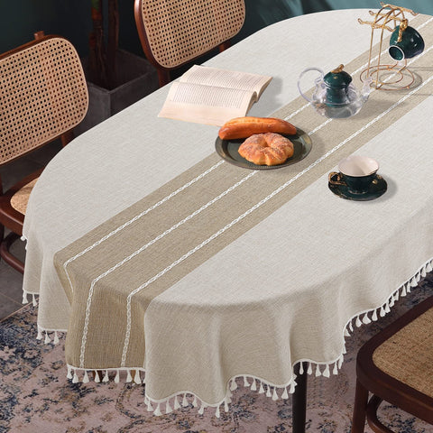Mantel ovalado HOMBYS con bordado de cuadros y borlas para cenas elegantes