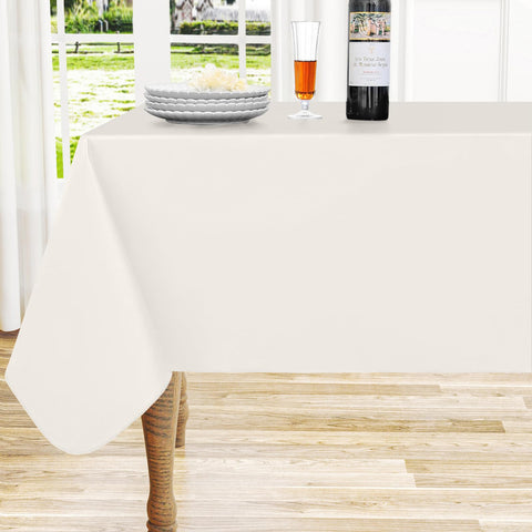 Mantel Homing impermeable en beige protege la mesa ante derrames.