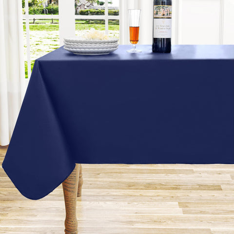 Mantel rectangular Homing de vinilo azul navy protege la mesa durante comidas.
