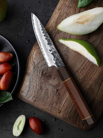 Corte eficiente de frutas y verduras con el cuchillo HOSHANHO.