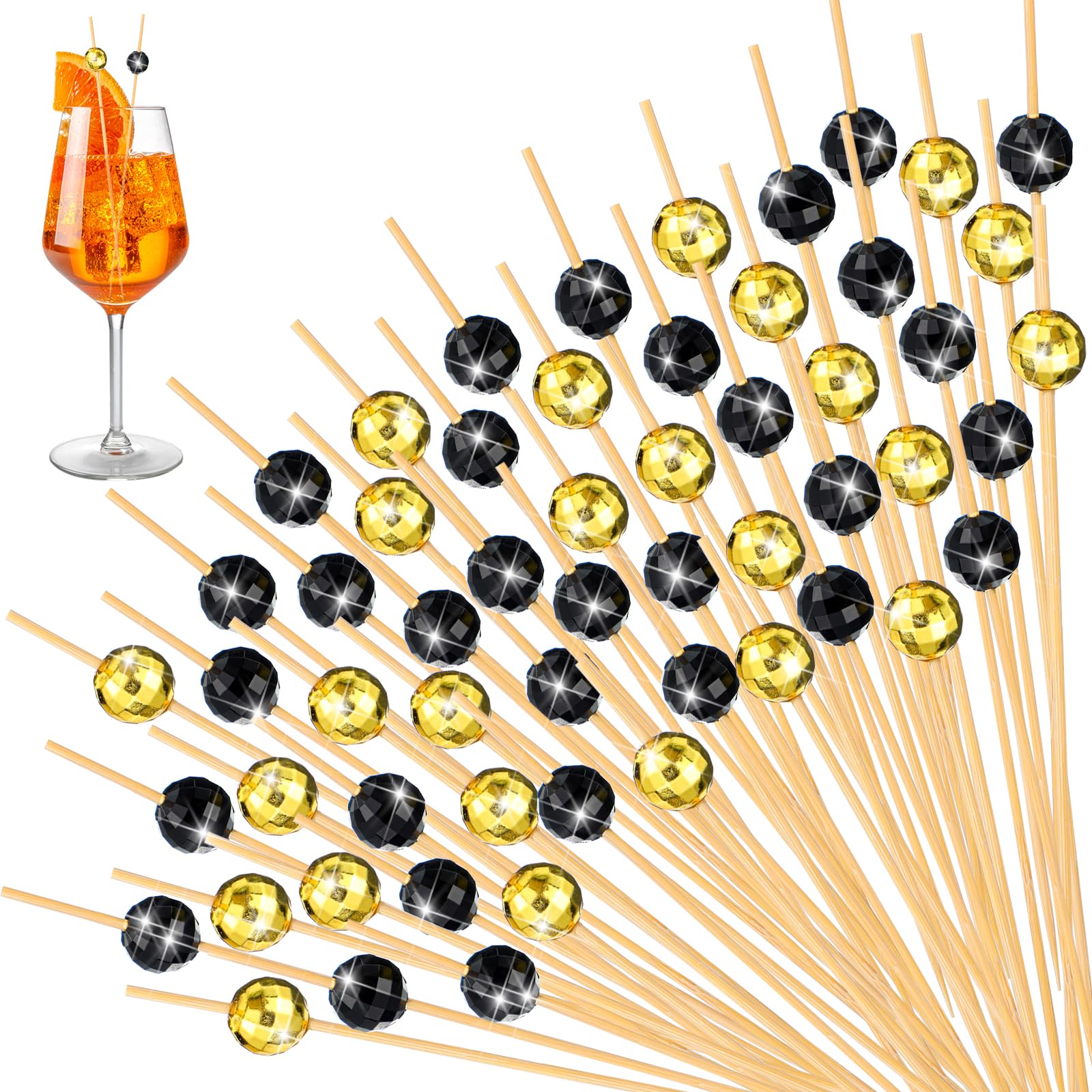 Pinchos Hushee con bola disco dorada y negra, ideales para cócteles y aperitivos.