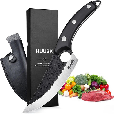 Cuchillo Huusk Vikingo con hoja forjada y filo afilado para despiece preciso.