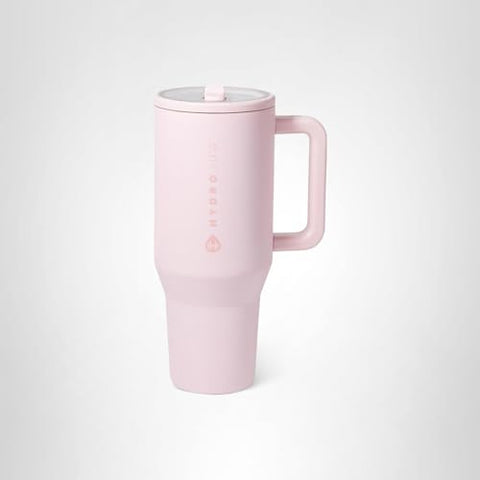 HydroJug Traveler en color rosa arena, estilo moderno para el día a día.