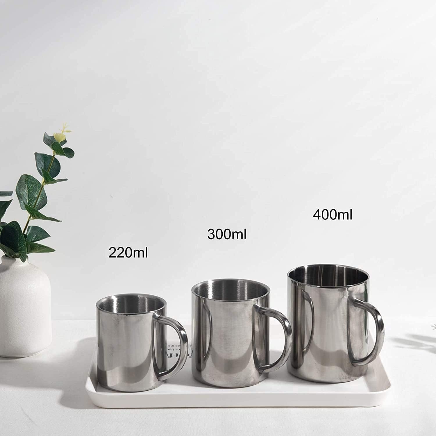 Taza IMEEA ergonómica con mango cómodo para beber en casa o camping.