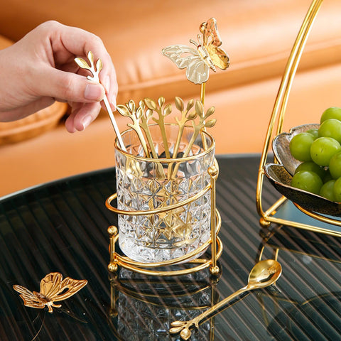 Conjunto INPROPEXT: cucharas de café doradas con porta-cristal.
