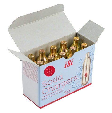 Cargadores iSi North America dorados en uso, generan burbujas rápidas para refrescos caseros.