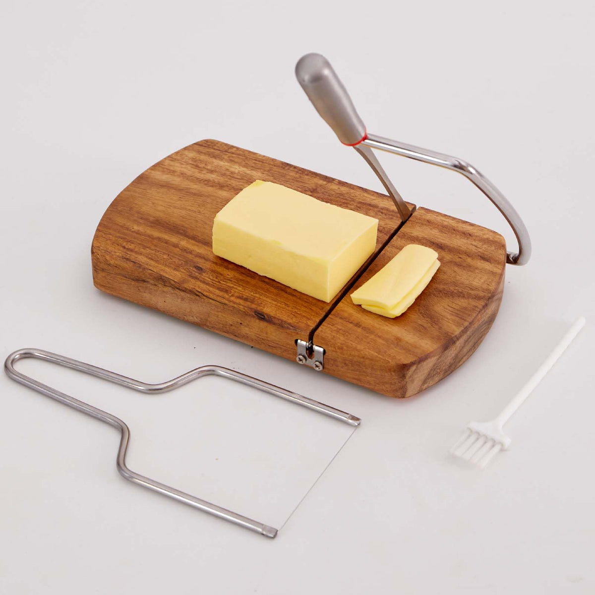 ISZW Cortaquesos sobre tabla de madera con cuchilla de acero para rebanar quesos