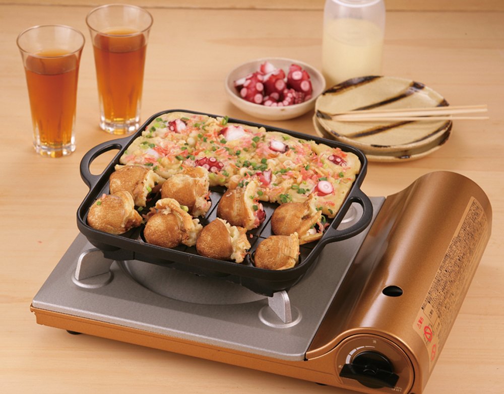 Iwatani Takoyaki Grill Pan Mediano Negro, uso versátil para recetas pequeñas y snacks.