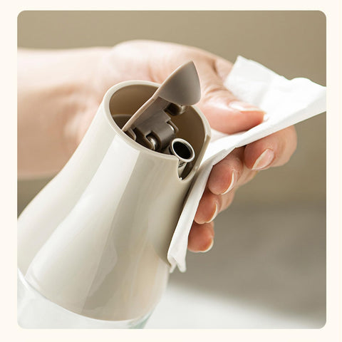 Dispensador JANSSE con tapa abatible segura para conservar frescura