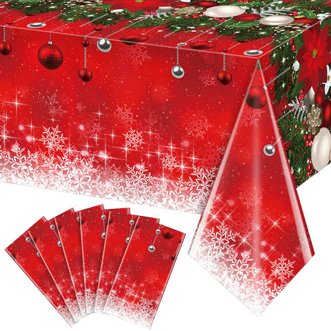 Mantel plástico navideño de Jectivs con bolas y árbol, ideal para decorar mesas.
