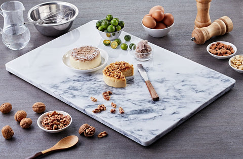 Mármol natural con vetas elegantes de JEmarble que embellece la cocina.