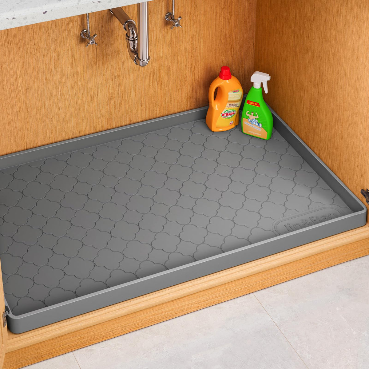 Alfombrilla Jin&Bao para debajo del lavabos 34x22 con borde elevado.