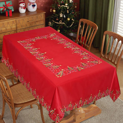 Mantel Jovialix rojo con bordado de árbol dorado para cena festiva.